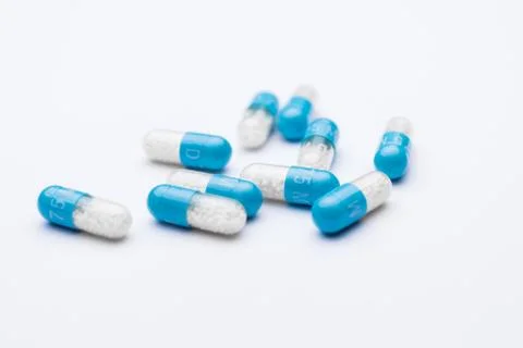Blue pill capsules isolated Stock Photos