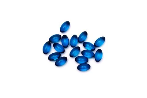 Blue pills isolated on white background. Stock Photos