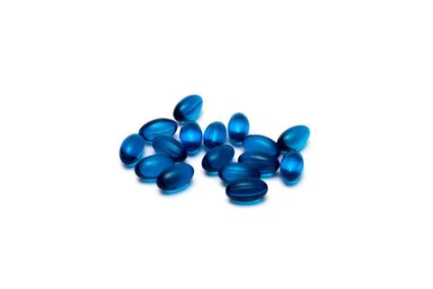Blue pills isolated on white background. Stock Photos