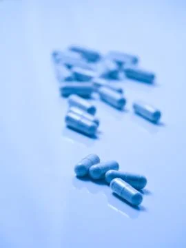 Blue pills Stock Photos