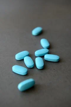 Blue pills Stock Photos