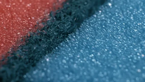 Blue pink sponge in close-up with smooth camera movement Stock Footage 131116391