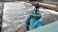 Blue pipeline with oxygen supply in water treatment plant. HD Footage