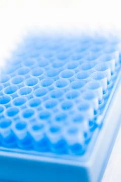 Blue pipette tips in container, shallow DOF Stock Photos