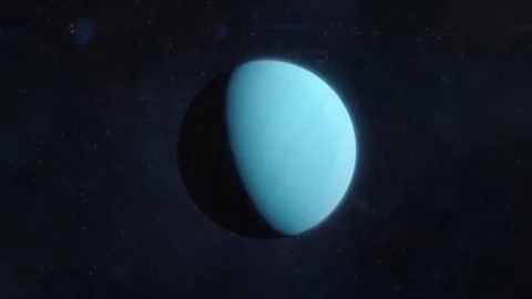 Blue planet uranus rotating in the deep dark cold space with distant stars. Stock Footage 346116740