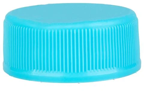 Blue plastic bottle cap on white background 库存照片