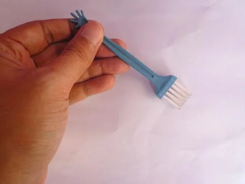 Blue plastic brush Stock Photos