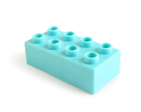 Blue plastic building block on white background Stock Photos