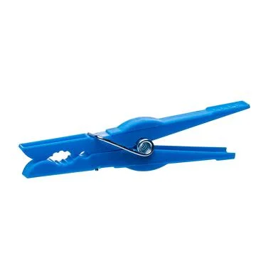 Blue plastic clothespin isolated on white background Stock-Fotos