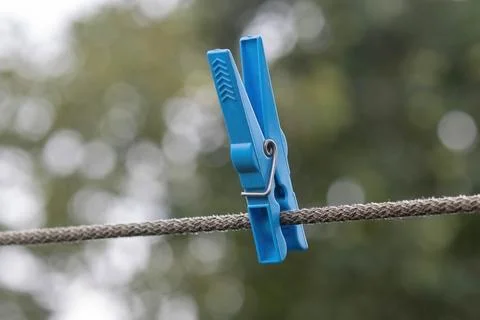 Blue plastic clothespin Stock Photos