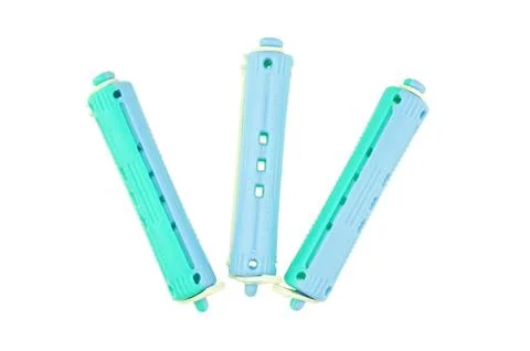 Blue plastic curler put as fork isolated Stock Photos