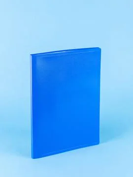 Blue plastic folder  for documents isolated on blue  background Stock Photos
