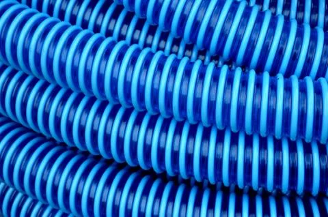 Blue plastic hose background Фото