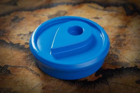 Blue Plastic Map Pointer Destination Pin on an Old Map. 3d Rendering Stock Illustration