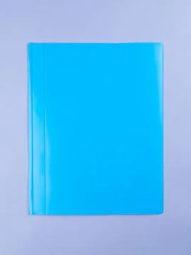 Blue plastic office folder on blue background. Office Folder Template Stock Photos