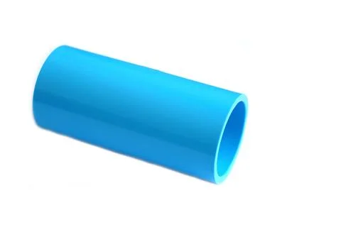 Blue plastic pipe isolated on white background, smooth cylindrical tube with cle Фото
