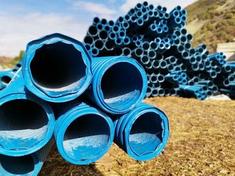 Blue plastic pipes. Stock Photos