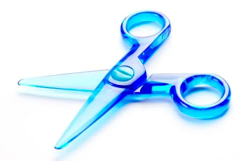 Blue plastic scissors Stock Photos
