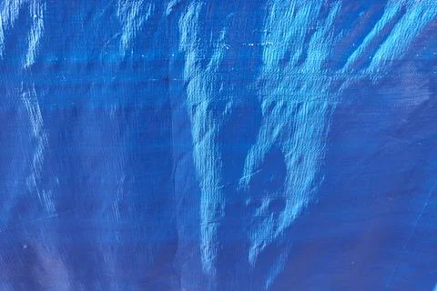 Blue plastic sheet texture background, closeup of photo with soft focus Stock Photos