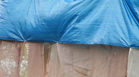 Blue plastic sheet on the wind Stock Footage 38967212