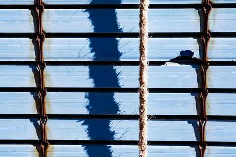 Blue plastic shutter in Alhambra Stock Photos