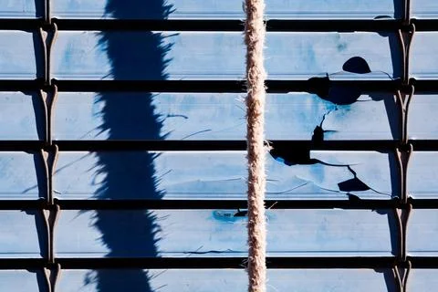 Blue plastic shutter in Alhambra Stock Photos