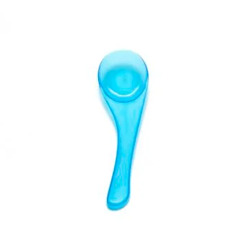 Blue plastic spoon Foto stock
