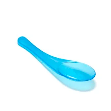 Blue plastic spoon Stock Photos
