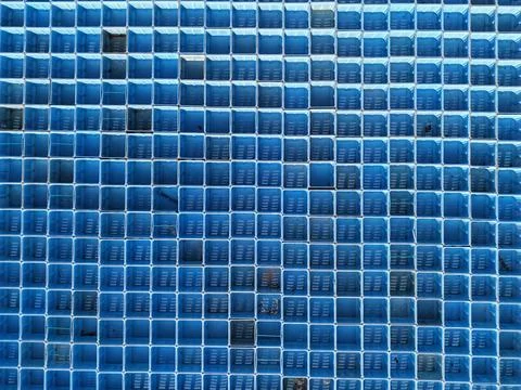 Blue plastic square repeating pattern industrial background Stock Photos