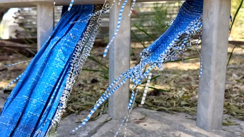 Blue plastic strip fluttering on the wind Stock Footage 156750971