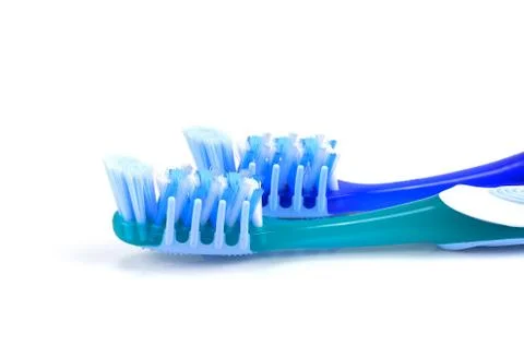 Blue plastic toothbrush, the top view, Composition of two toothbrushes Stock Photos
