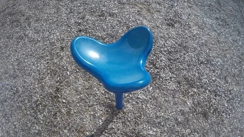Blue Playground Spinner 4K Stock Footage 101402423