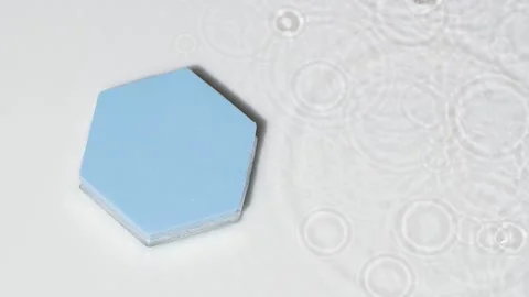 Blue podium top view, rain drops on water surface on grey, product design mockup Stock Footage 207653404