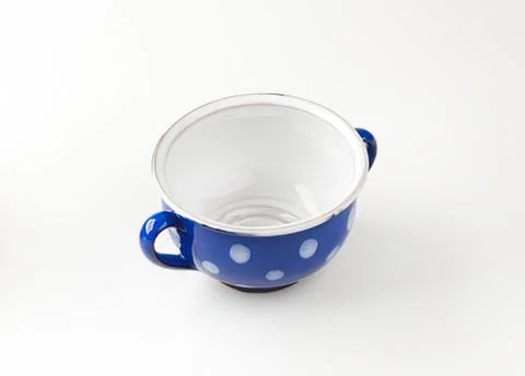Blue polka dot coffee cup with handle Photos