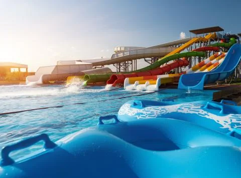 Blue pool float, ring floating lying by the refreshing swimming pool. Empty r Fotos de archivo