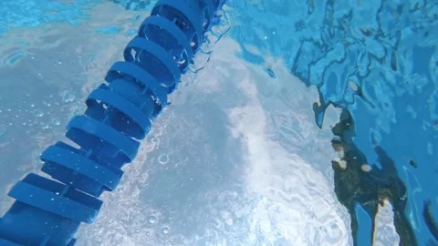 Blue pool lane rope drifting underwater in outdoor swimming pool Stock Footage 342157638