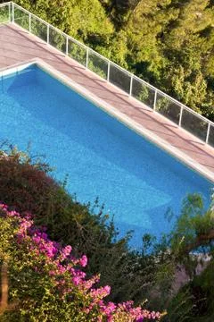 Blue pool in the summer sun Foto stock