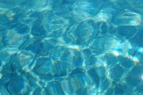 Blue pool water for background close up Stock Photos
