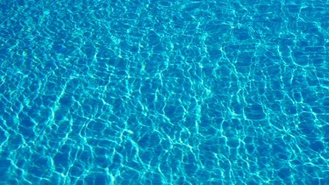 Blue pool water as background texture for artists Stock Photos
