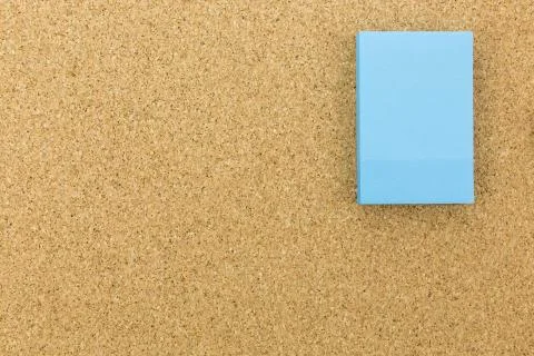 Blue post it on cork board Stock Photos