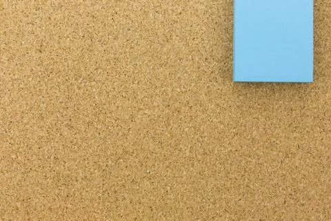 Blue post it on cork board Stock Photos
