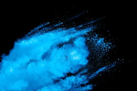 Blue powder explode cloud on black background. Stock Photos
