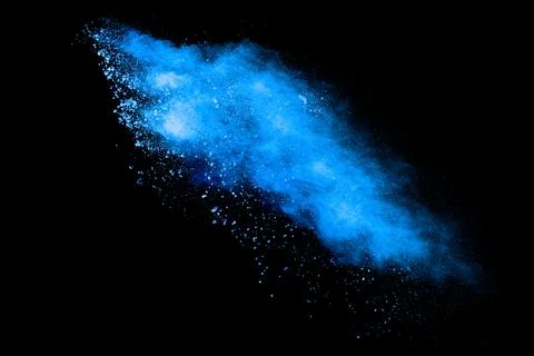 Blue powder explosion cloud on black background.Launched blue dust particle.. イラスト素材
