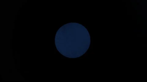 Blue powder/particles fly after being exploded.  4K 30fps. Slow Motion. Stock Footage 55536032