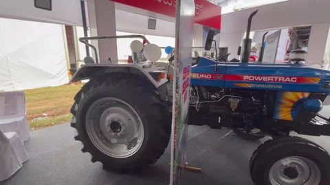 A blue Powertrac tractor Vídeo Stock 346814732