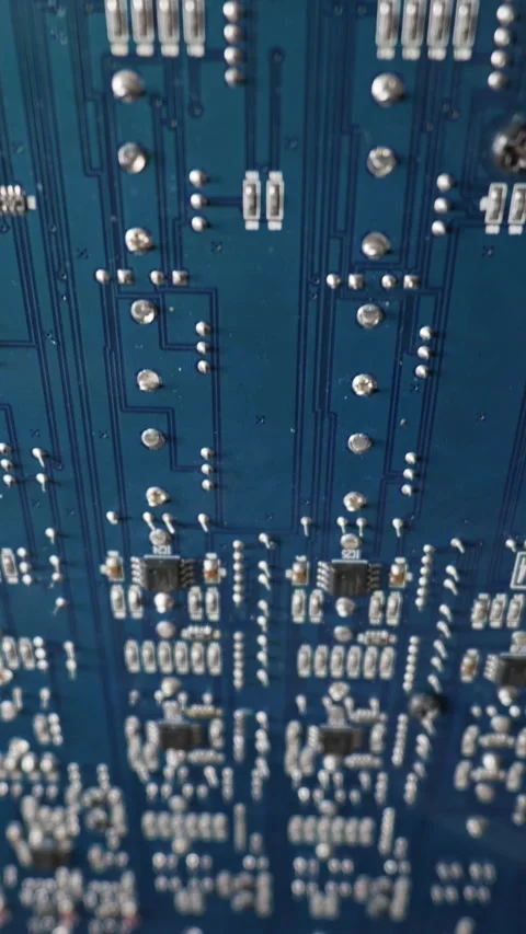 Blue Printed Circuit Board Processing Data Within Complex Tech Hardware Stock Footage 334114574