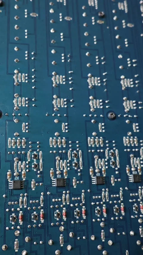 Blue Printed Circuit Board with Surface Mount Electronic Components Stock Footage 334114339