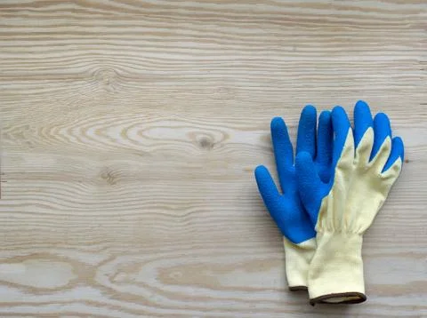 Blue protective rubber gloves for construction and operation with caustic Stock Photos