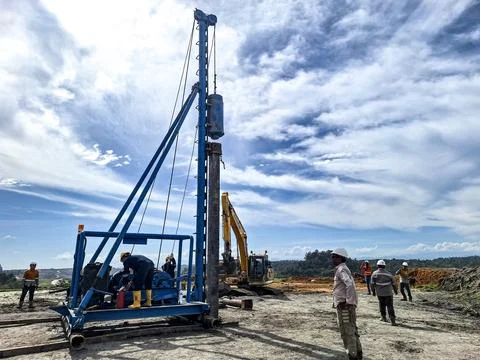 Blue pump jack Stock Photos