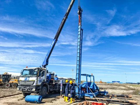 Blue pump jack Stock Photos